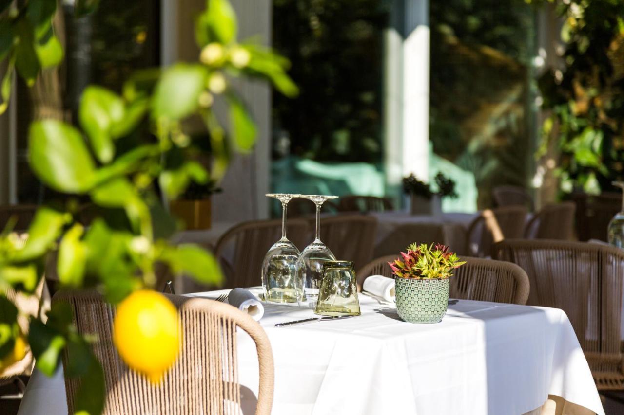 Hotel Baia Azzurra - Lake Front Torbole Sul Garda Extérieur photo